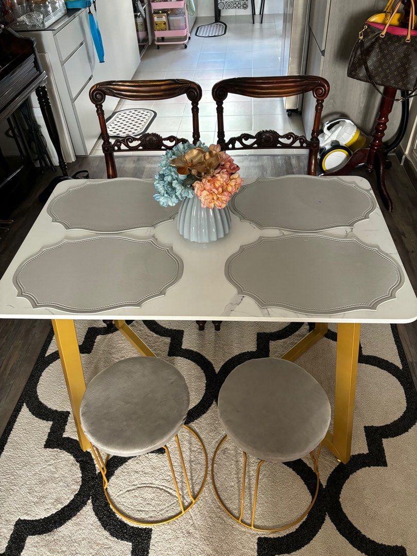 Dining Table Set (Category: Tables & Sets) located in Singapore. Submitted by pinkxbluebow (Listing ID 1303437320, Image 1). Description: (Like new) Marble top table (1m) includes 2 chairs and 2 stools.(well used).