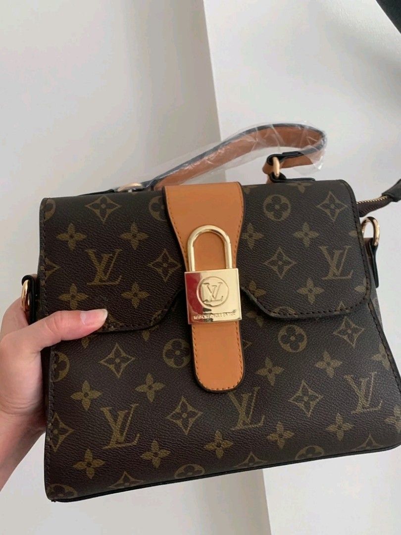 Louis Vuitton (Category: Luxury Bags & Wallets) located in Manila. Submitted by assortedthingsforsale (Listing ID 1303439132, Image 1). Description: Louis Vuitton Brand New magnetic lock 3 compartments Coded Hand Bag with Sling Gold Hardware Dust Bag (no box).