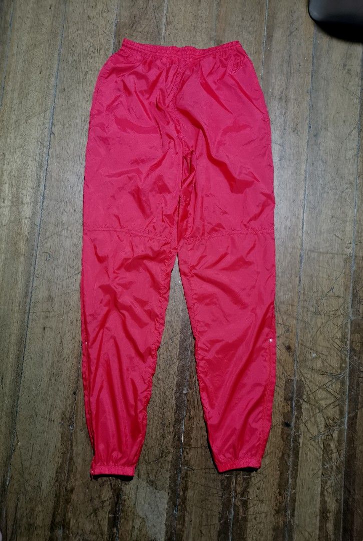 Vintage nike windbreaker pants (Category: Joggers) located in Lapu Lapu. Submitted by cryptocoryne (Listing ID 1303544639, Image 2). Description: vintage nike windbreaker pants medium on tag 26-34 x 41.5 excellent condition like new no issue.