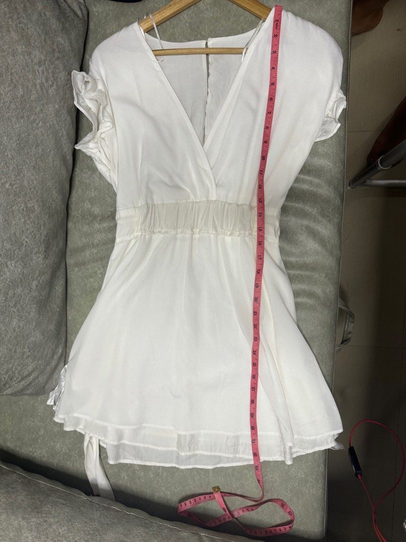 Zara White V Neck Dress (Category: Dresses) located in Pasig City. Submitted by misisfinds (Listing ID 1299768263, Image 3). Description: Garterized waist can fit xs to medium (24-32 inches waistline) Shoulder to hem length: 32 inches.