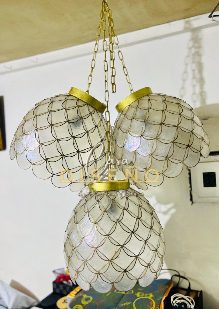 Capiz pendant light (Category: Lighting) located in Caloocan City. Submitted by casadisenyo (Listing ID 1303596038, Image 2). Description: Size 12" x 12" 3pcs available ON HAND Message me, reply fast.