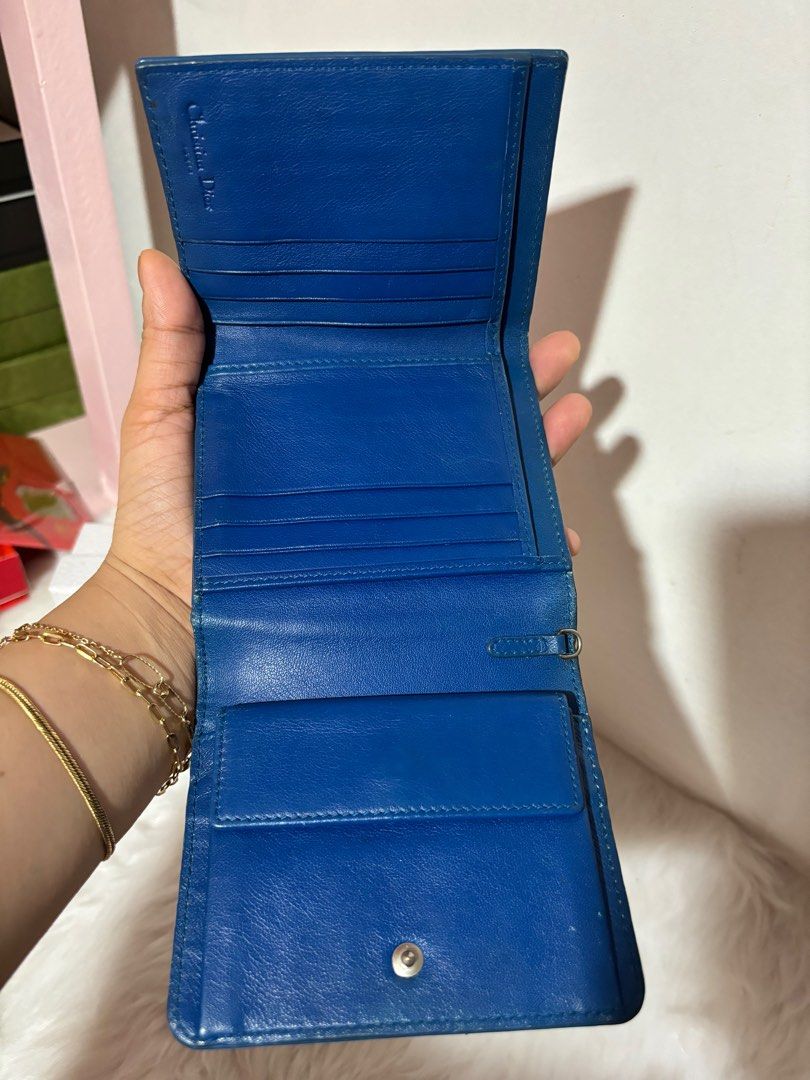 Dior Trifold Compact Patent Short Wallet (Category: Luxury Bags & Wallets) located in Quezon City. Submitted by box.luxebycheng (Listing ID 1303742960, Image 2). Description: Comes with box, paperbag and dustbag Has minor signs of usage but still presentable Missing Dior Charm.