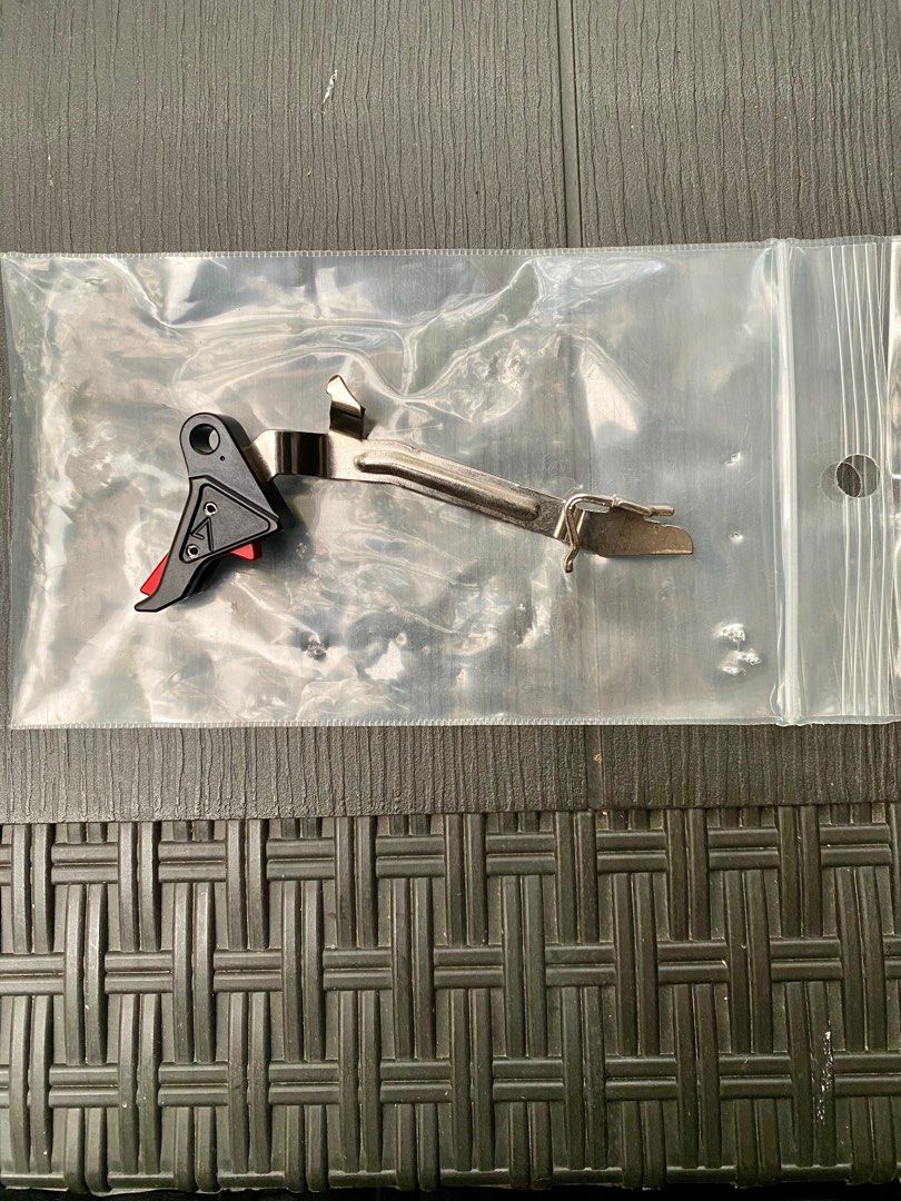 Glock flat-faced Agency Arms trigger assembly (Category: Action & Battle Toys) located in Davao. Submitted by 09166614444 (Listing ID 1303751427, Image 1). Description: Sale or swap. Agency Arms drop-in trigger assembly for Glock Gen 1-4. Fitted only. Bought for 14k++ at Laz. Swap to Tyrant Designs trigger shoe welcome. Shipping at buyers expense. LBC COP.