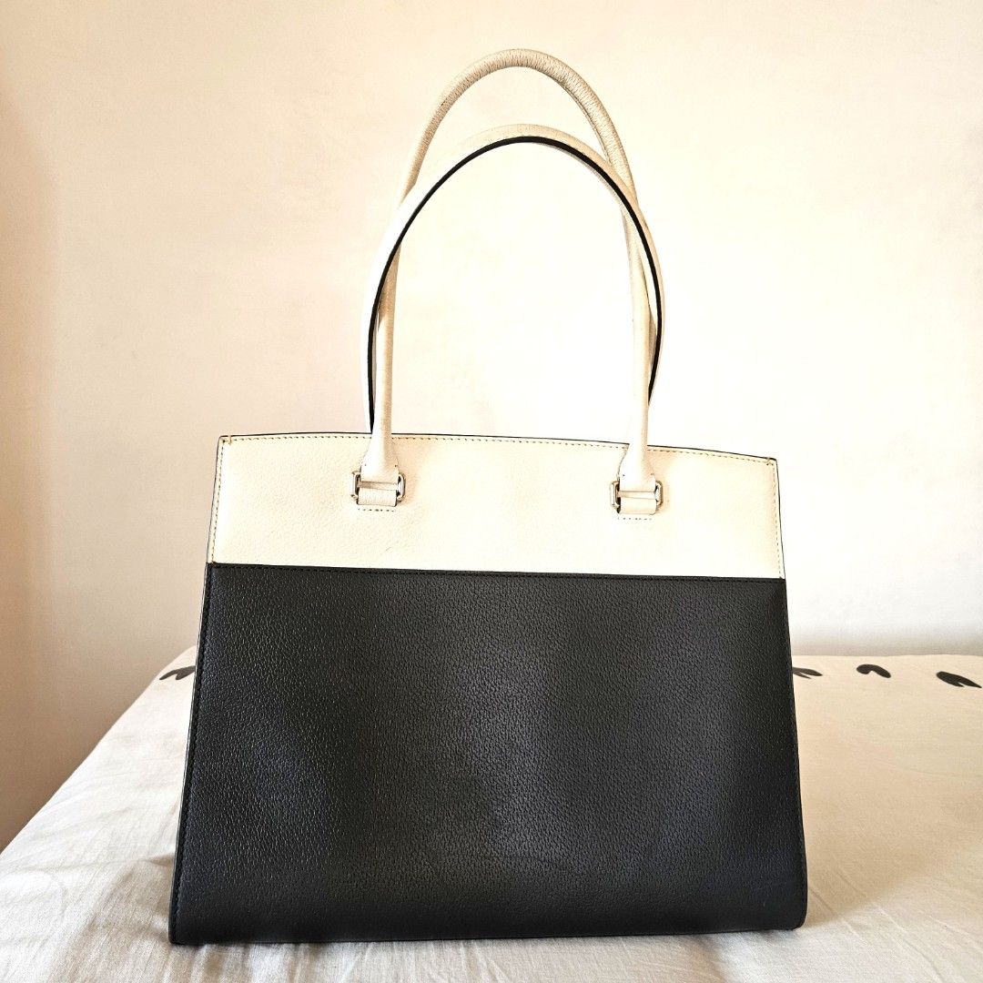 KS Grove St Maeve bag (Category: Luxury Bags & Wallets) located in Cabuyao City. Submitted by happy.finds (Listing ID 1303605461, Image 2). Description: Original Kate Spade, bought in Canada. Elegant black and white colorway. This is roomy and sturdy bag. I used sa office and for travel, kasya big laptop. I stopped working na so not using anymore. Just need minor cleaning ng handles, else very good condition. see last 2 photos for bag details. be