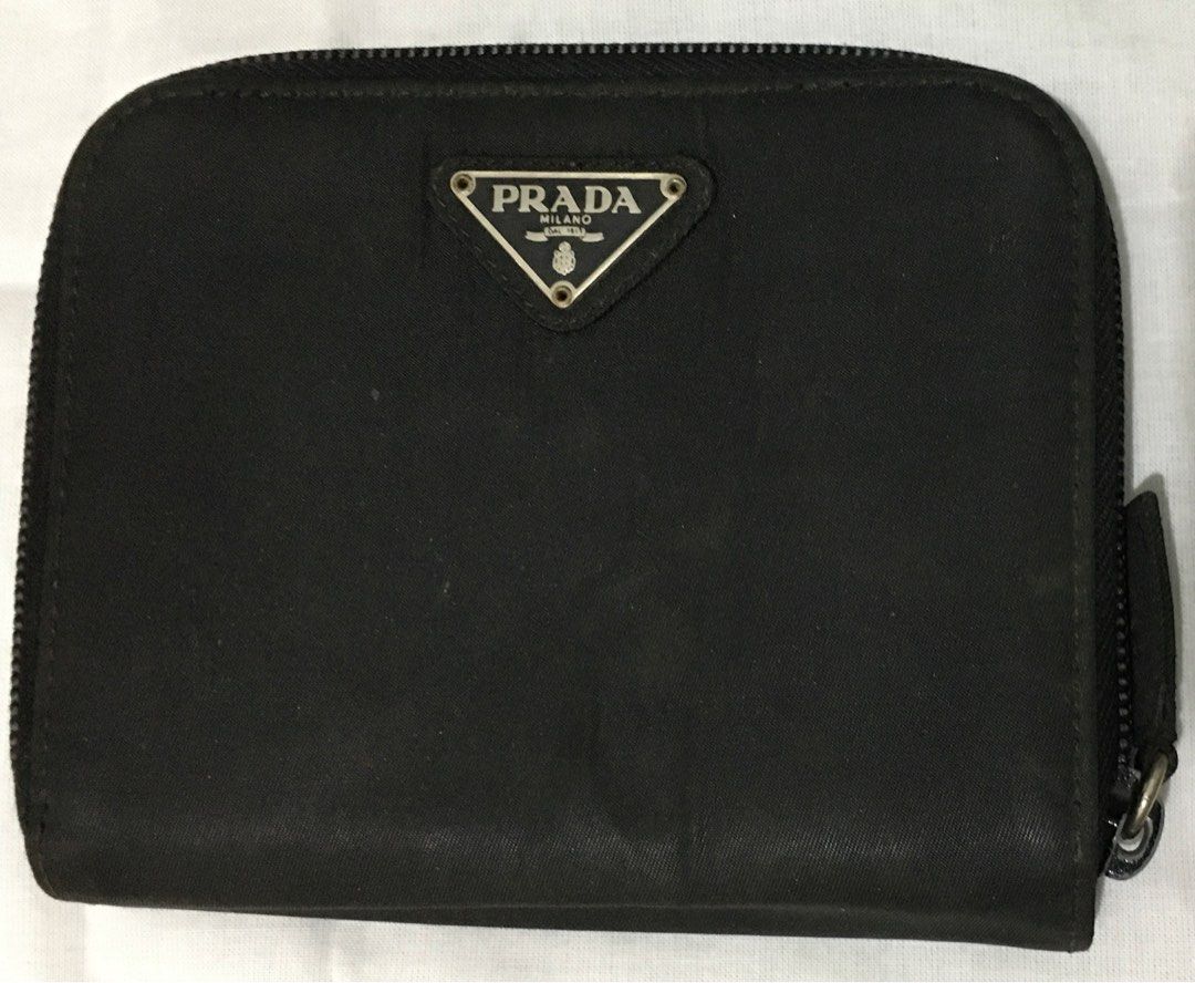Original Preloved Prada Wallet (Category: Luxury Bags & Wallets) located in Pasig City. Submitted by bashadp (Listing ID 1303723262, Image 2). Description: Bought from Japan Second Hand / Preloved Authentic.