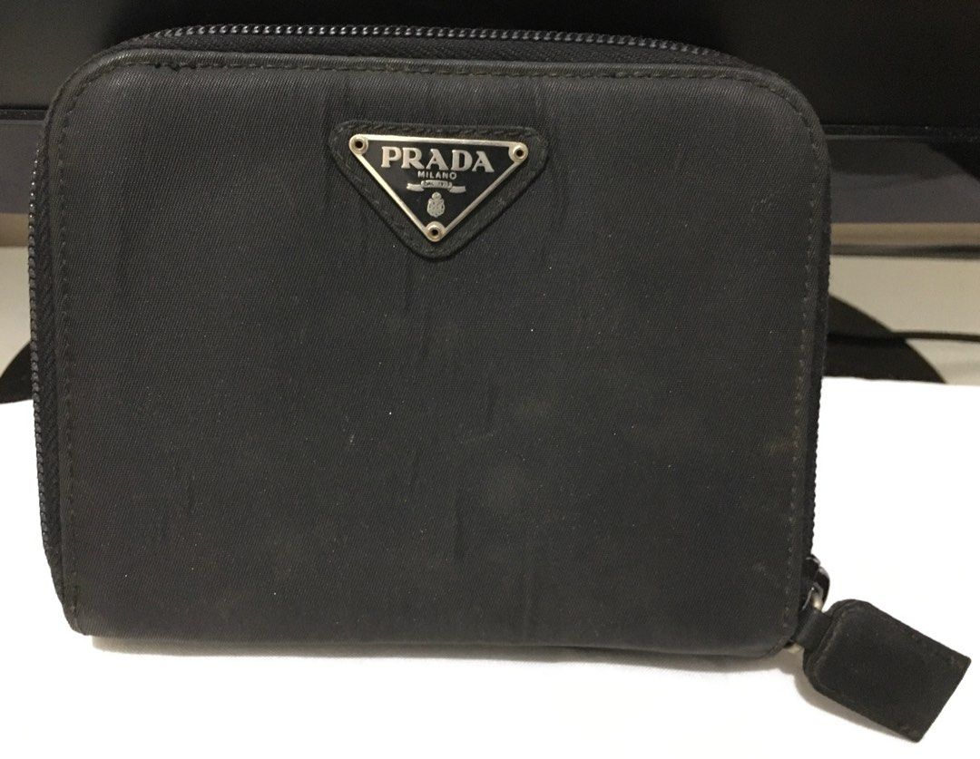 Original Preloved Prada Wallet (Category: Luxury Bags & Wallets) located in Pasig City. Submitted by bashadp (Listing ID 1303723262, Image 1). Description: Bought from Japan Second Hand / Preloved Authentic.