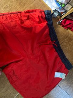 Red board shorts branded