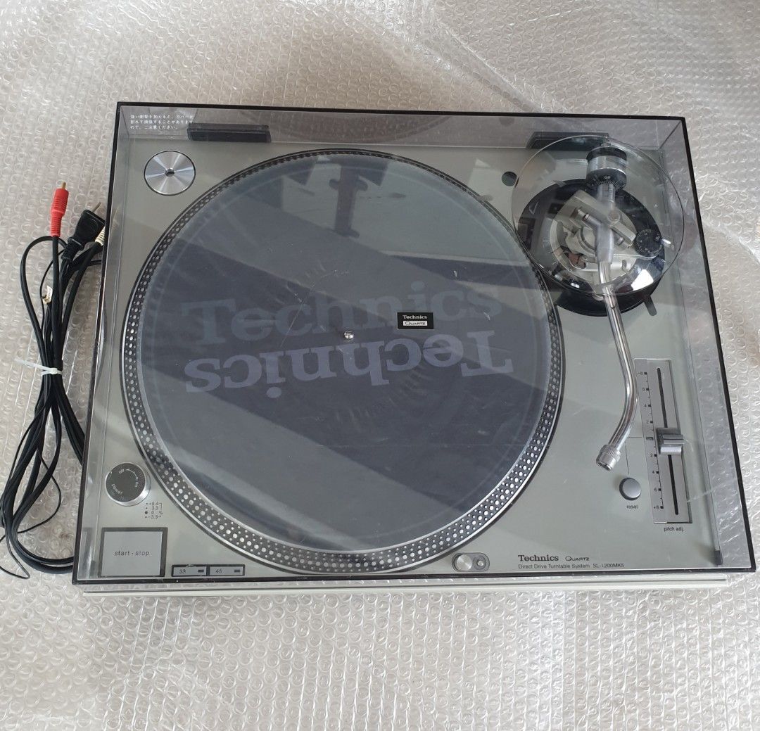 Technics SL-1200MK5 Turntable (Category: Soundbars, Speakers & Amplifiers) located in Manila. Submitted by racz03 (Listing ID 1303754489, Image 2). Description: New Arrival Technics SL-1200MK5 Direct Drive Turntable. Appearance: Mint Condition No Scratches on The Body. Tested, in Excellent Working Condition. It Comes With: Slipmat, Rubber Mat, Plastic mat, 45 rpm Adapter, Dustcover & Auxiliary Weight, With Original High Fedelity Technics Rca Cord