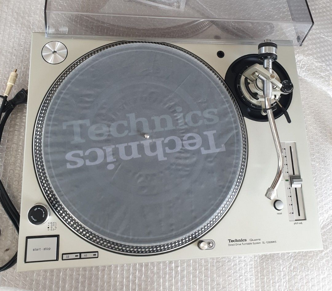 Technics SL-1200MK5 Turntable (Category: Soundbars, Speakers & Amplifiers) located in Manila. Submitted by racz03 (Listing ID 1303754489, Image 1). Description: New Arrival Technics SL-1200MK5 Direct Drive Turntable. Appearance: Mint Condition No Scratches on The Body. Tested, in Excellent Working Condition. It Comes With: Slipmat, Rubber Mat, Plastic mat, 45 rpm Adapter, Dustcover & Auxiliary Weight, With Original High Fedelity Technics Rca Cord