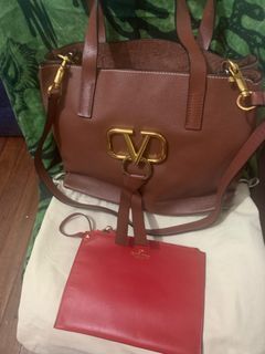Valentino pure leader bag with red pouch..Class A/width 12inches-length 10inches