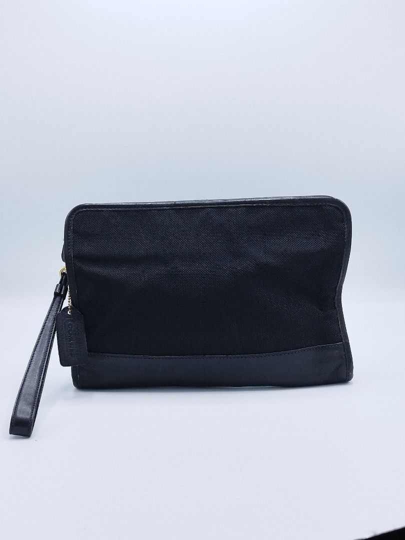 Vintage COACH Clutch bag (Category: Luxury Bags & Wallets) located in Quezon City. Submitted by redragtag (Listing ID 1303723173, Image 1). Description: Authentic Vintage Coach Height 7" x Length 10.75" x Depth 2" canvas and leather detachable leather wristlet brass hardware - light rubs on leather - no holes, no rip or tear inside and out - all functional - overall condition is excellent.