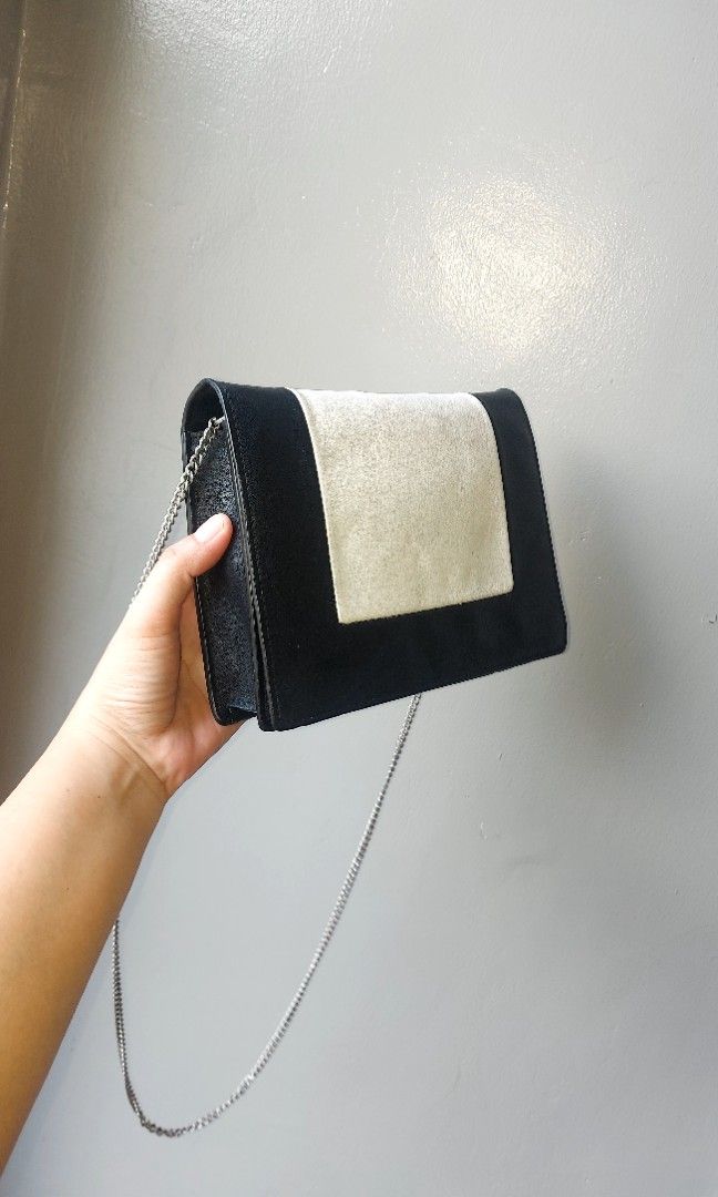 Authentic Celine Frame Woc Shoulder Bag (Category: Luxury Bags & Wallets) located in Subic. Submitted by luxshoppe88 (Listing ID 1303873612, Image 3). Description: Authentic Celine Frame Bag made in Italy w/ serial flap button closure many compartments cards slot bills slot full zip compartment still in good used condition Issue: has minimal press marks.. nag fade name nakasulat na silver (celine) sa lower front niya.. readable pa naman basta tit