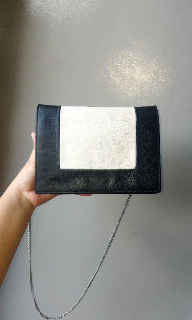 Authentic Celine Frame Woc Shoulder Bag (Category: Luxury Bags & Wallets) located in Subic. Submitted by luxshoppe88 (Listing ID 1303873612, Image 2). Description: Authentic Celine Frame Bag made in Italy w/ serial flap button closure many compartments cards slot bills slot full zip compartment still in good used condition Issue: has minimal press marks.. nag fade name nakasulat na silver (celine) sa lower front niya.. readable pa naman basta tit
