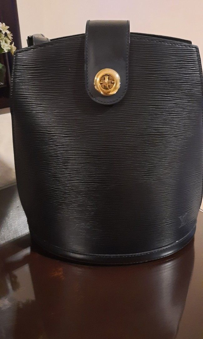 Authentic lv epi bag (Category: Luxury Bags & Wallets) located in Manila. Submitted by nyeragiti (Listing ID 1303851123, Image 2). Description: pre-loved but well used. classic and elegant. has minor signs of use but still in very good condition. lightly faded leather around the gold lock but almost unnoticeable. bag ONLY. BPI or gcash payment. delivery fee c/o buyer.