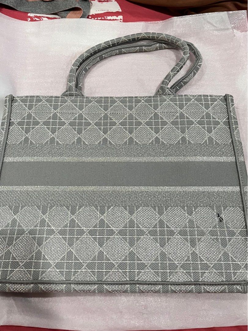 Christian Dior canvass book bag (Category: Shoulder Bags) located in Antipolo. Submitted by mancstan20 (Listing ID 1303912061, Image 2). Description: pm for details.