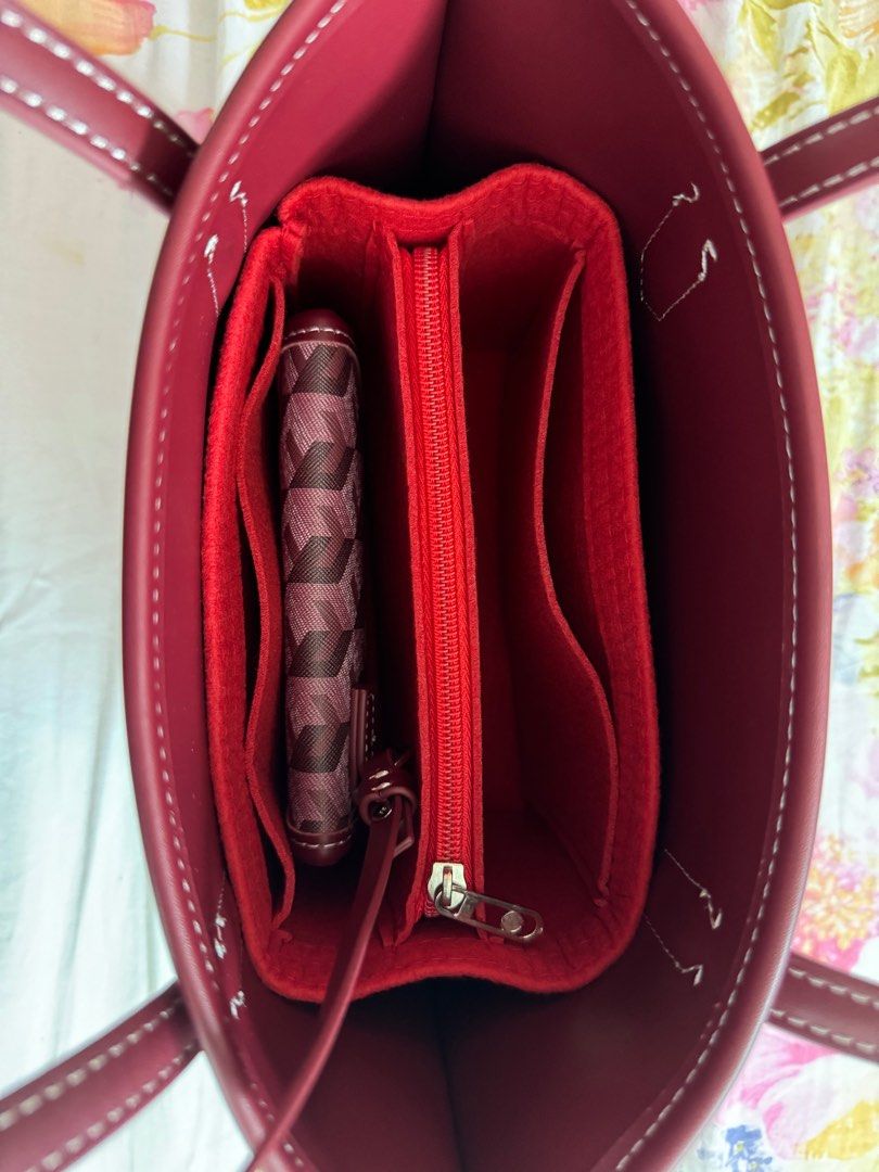 Christy Ng Mini Russo tote bag (Category: Tote Bags) located in Rizal. Submitted by katmandulovesmakeup (Listing ID 1303771652, Image 3). Description: Maroon color Excellent condition with dust bag Used twice only With bag organizer already Includes pouch .