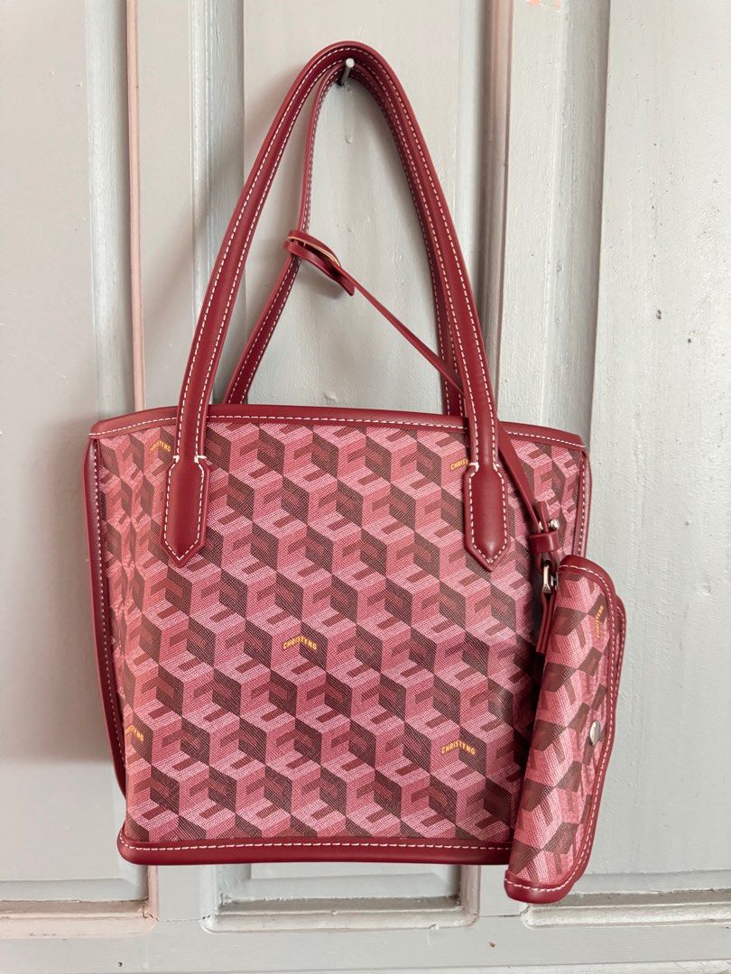 Christy Ng Mini Russo tote bag (Category: Tote Bags) located in Rizal. Submitted by katmandulovesmakeup (Listing ID 1303771652, Image 2). Description: Maroon color Excellent condition with dust bag Used twice only With bag organizer already Includes pouch .