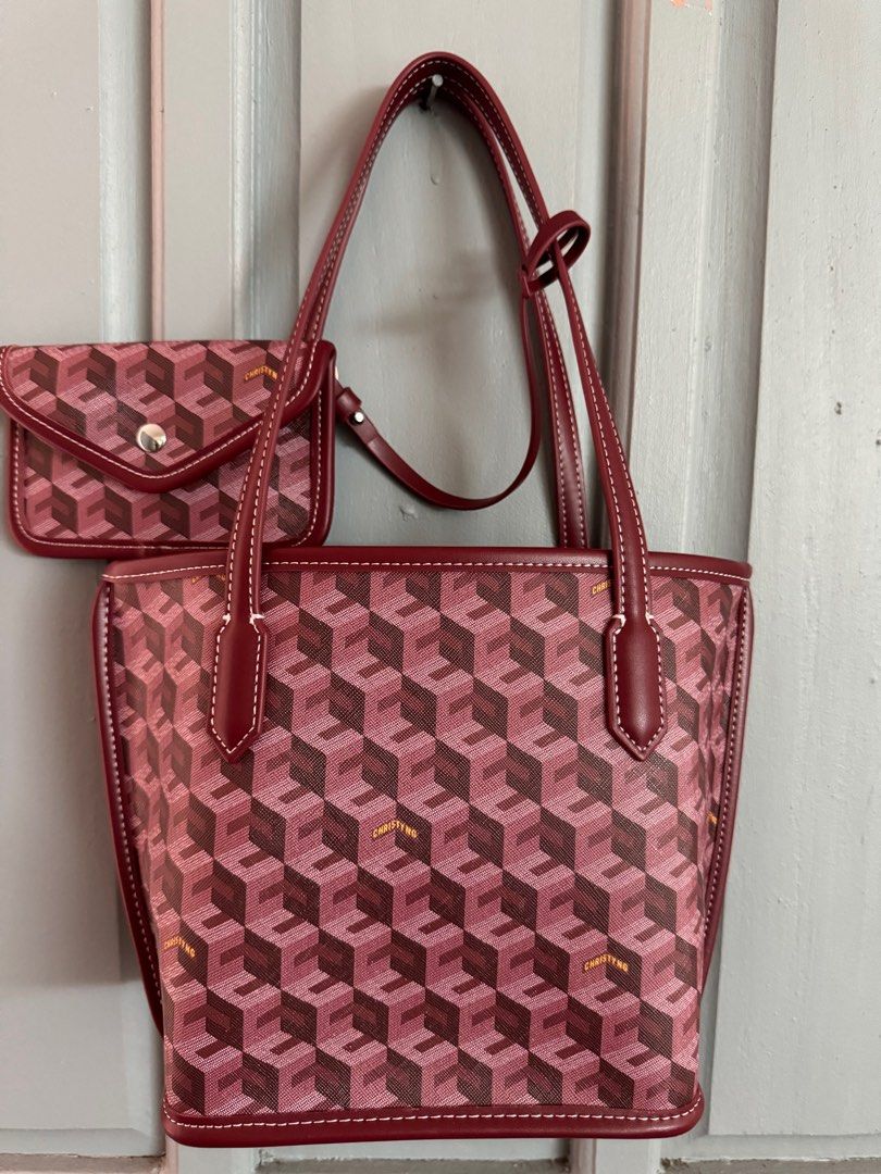 Christy Ng Mini Russo tote bag (Category: Tote Bags) located in Rizal. Submitted by katmandulovesmakeup (Listing ID 1303771652, Image 1). Description: Maroon color Excellent condition with dust bag Used twice only With bag organizer already Includes pouch .
