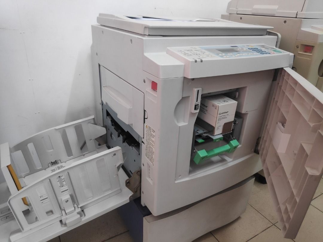 Digital Duplicator (Category: Printers, Scanners & Copiers) located in Malabon City. Submitted by behind.boxes (Listing ID 1303761975, Image 3). Description: Digital Duplicator * 130 PPM Speed A4 size * 2nd hand units Imported from US * Good Working Condition/ tested printing/ Newly Overhauled drum * Supplies friendly Branded as: * Ricoh Priport DX3343 * Lanier LDD130 * Gestetner CP6143L * Savin 3183 DNP Interested Buyers call for viewing 0916 70