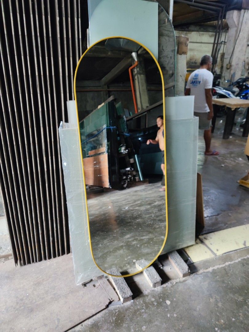Oval mirror with gold aluminum frame (Category: Mirrors) located in Malabon City. Submitted by mirrors.ph (Listing ID 1303782871, Image 2). Description: Oval mirror with gold aluminum frame and plywood backing using 6mm thick copper free mirror Size: 2ft x 5ft P2700 Add P200 if with back hook.