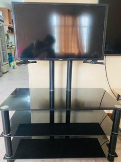 Samsung 32” TV with glass rack