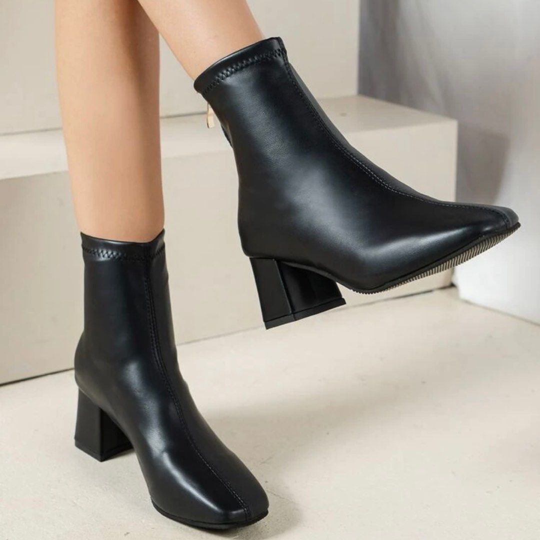 Black zip back heeled boots top