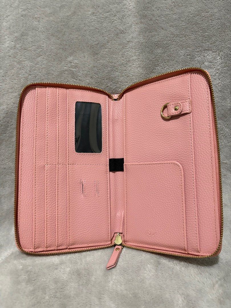 Typo travel wallet organizer (Category: Wallets & Card holders) located in Cavite. Submitted by rachgoshopping (Listing ID 1303906670, Image 3). Description: Not used but no inclusion Super nice material no bakbak and any flaws.