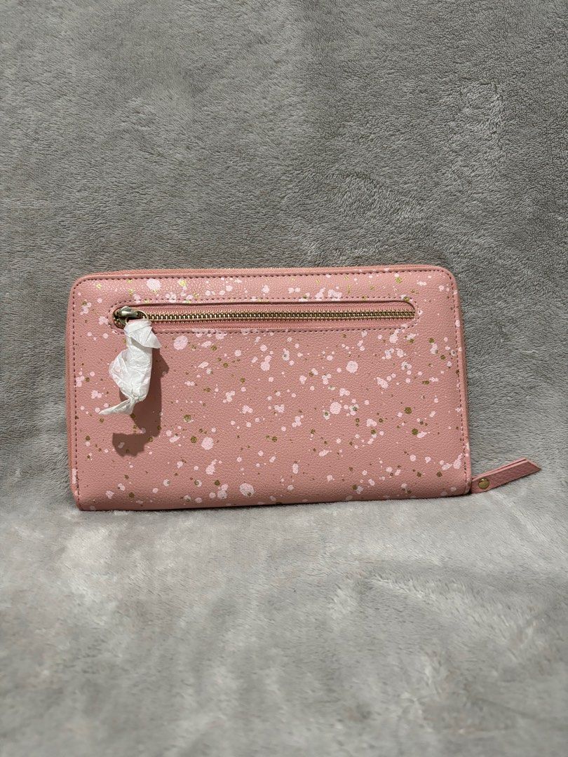 Typo travel wallet organizer (Category: Wallets & Card holders) located in Cavite. Submitted by rachgoshopping (Listing ID 1303906670, Image 2). Description: Not used but no inclusion Super nice material no bakbak and any flaws.