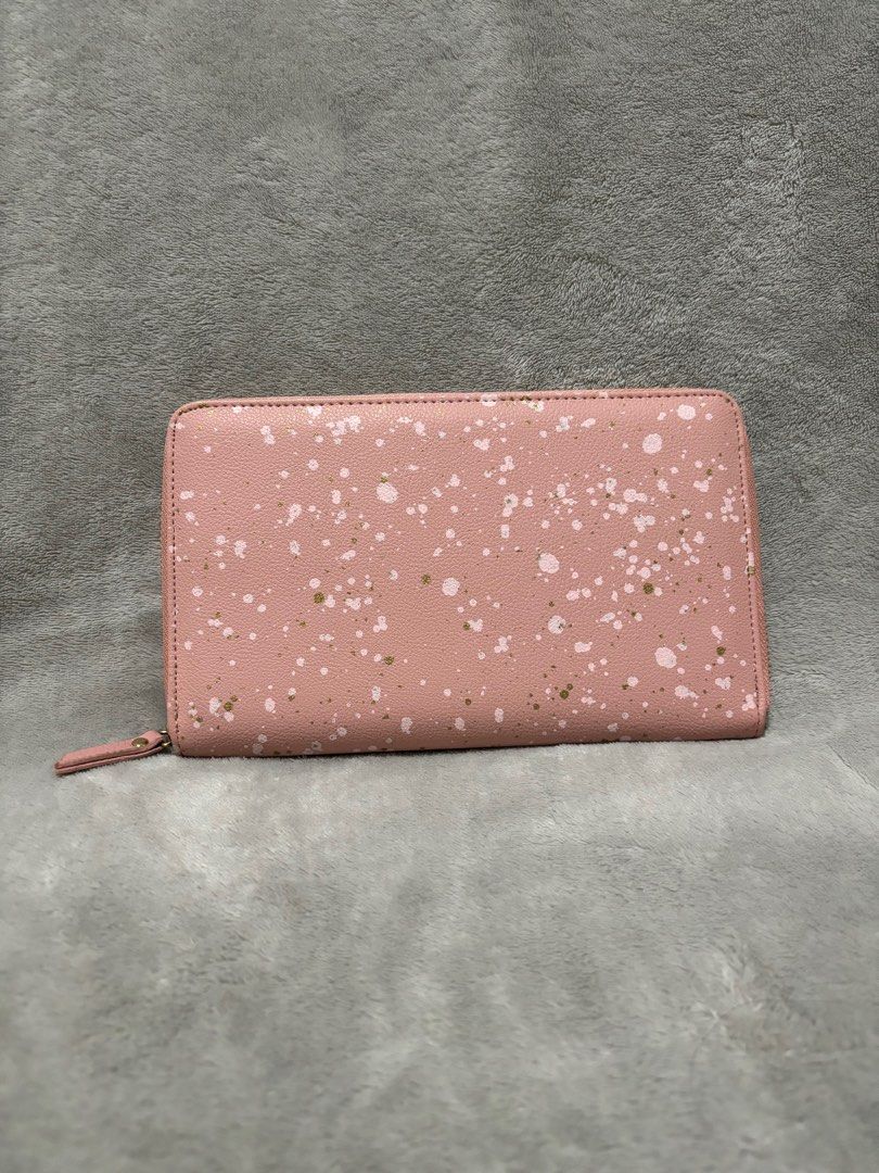 Typo travel wallet organizer (Category: Wallets & Card holders) located in Cavite. Submitted by rachgoshopping (Listing ID 1303906670, Image 1). Description: Not used but no inclusion Super nice material no bakbak and any flaws.