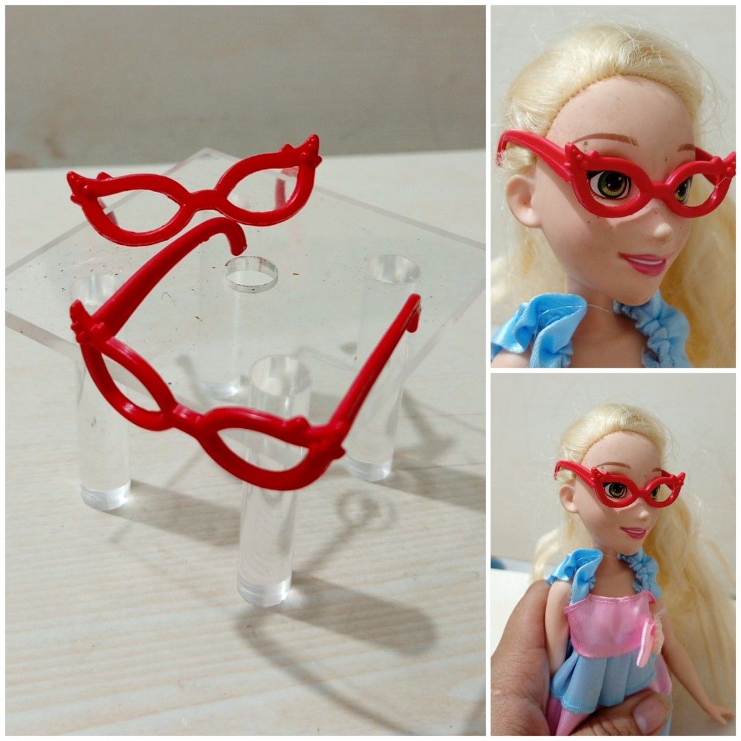 2pcs red eyeglasses for barbiedolls (Category: Sunglasses & Eyewear) located in Echague. Submitted by manikaisabelavarietyshop (Listing ID 1303964887, Image 1). Description: P20 2pcs red eyeglasses for barbiedolls.
