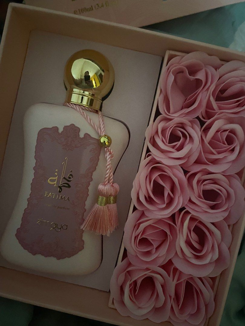 Afnan Zimaya Fatima 100ml (Category: Fragrance & Deodorants) located in Quezon City. Submitted by cookiekay (Listing ID 1303981771, Image 1). Description: Still comes with the box 📍QC AROUND 85-90% juice level (see photo for reference) DECLUTTERING.