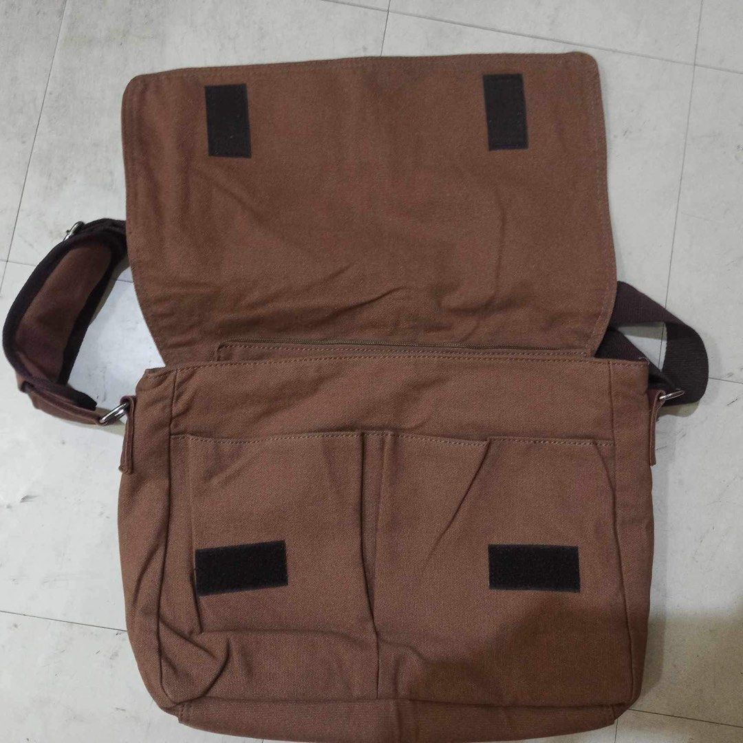Augur Messenger Sling Bag (Category: Sling Bags) located in Quezon City. Submitted by trishiaa21 (Listing ID 1304075630, Image 2). Description: Brand: Augur >Measurements (L 39 x W 12 x H 30) >Brand New Condition >Material: polyester cotton >Brown Location: Cainta, Rizal.