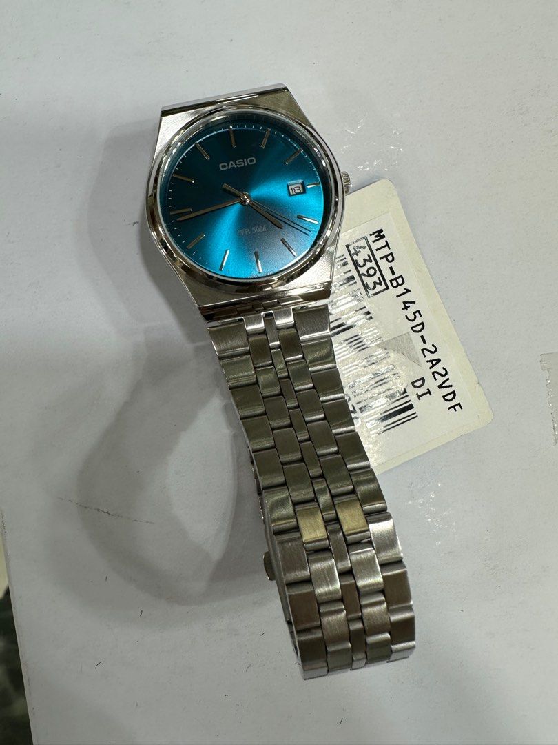Casio Watch MTP-B145D-2A2 (Category: Men's Watches) located in Manila. Submitted by seikowatchfactory (Listing ID 1304082247, Image 2). Description: BNIB 10/10 Model: MTP-B145D-2A2 Price: 3000 pesos Specifications: Size of Case: 40 x 35 x 7.4mm Total Weight: 82g Approx. Battery Life: 3 years on SR621SW Regular Timekeeping 50m Water Resistance Date display Mineral Glass Stainless Steel One-Touch Triple fold clasp Quartz Movement Seller is Authoriz