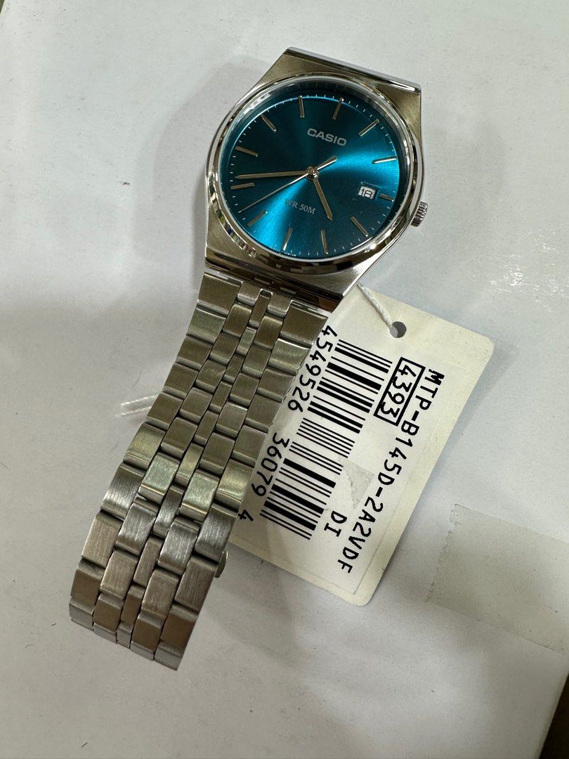 Casio Watch MTP-B145D-2A2 (Category: Men's Watches) located in Manila. Submitted by seikowatchfactory (Listing ID 1304082247, Image 3). Description: BNIB 10/10 Model: MTP-B145D-2A2 Price: 3000 pesos Specifications: Size of Case: 40 x 35 x 7.4mm Total Weight: 82g Approx. Battery Life: 3 years on SR621SW Regular Timekeeping 50m Water Resistance Date display Mineral Glass Stainless Steel One-Touch Triple fold clasp Quartz Movement Seller is Authoriz