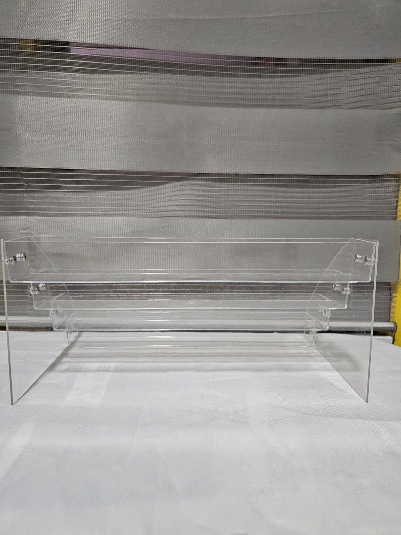 4-Tier Acrylic Case Stand (Category: Makeup) located in Mandaluyong City. Submitted by adie_sells (Listing ID 1304098193, Image 3). Description: - 4-Tier Acrylic Case Stand for Lipsticks/Sonny Angels/Etc. - Light Scratches - MOP: GCASH - MOD: JnT/Grab/Lalamove.