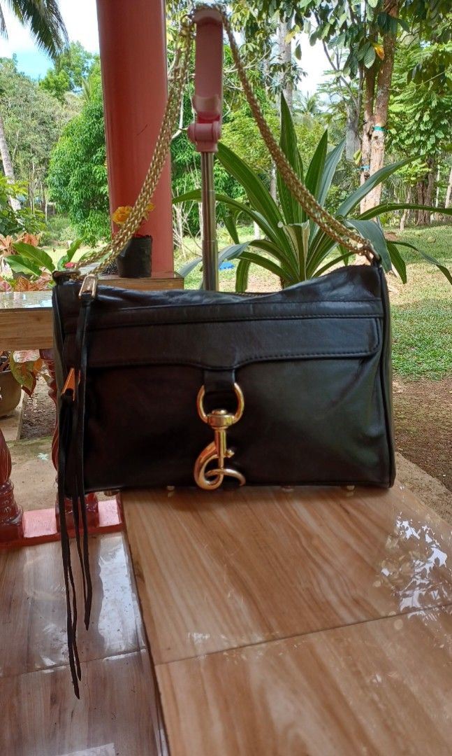 Mark down‼️Authentic Rebecca Minkoff Semi-Large to Large .Shoulder or Cross-body. (Category: Luxury Bags & Wallets) located in Oroquieta. Submitted by repontemar42947 (Listing ID 1304232101, Image 1). Description: Replacement sling but super gold and bagay na bagay din,with minimal sign of use only,still pretty and durable brand bag..