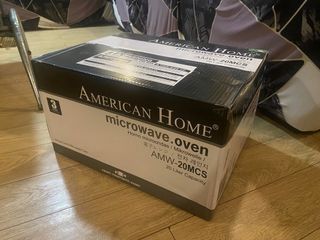 Brand new American Home AMW-20MCS Mechanical Microwave Oven