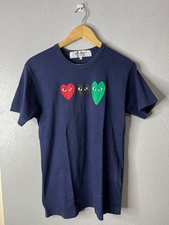 CDG. Size medium on tag but fits small at 18 by 27