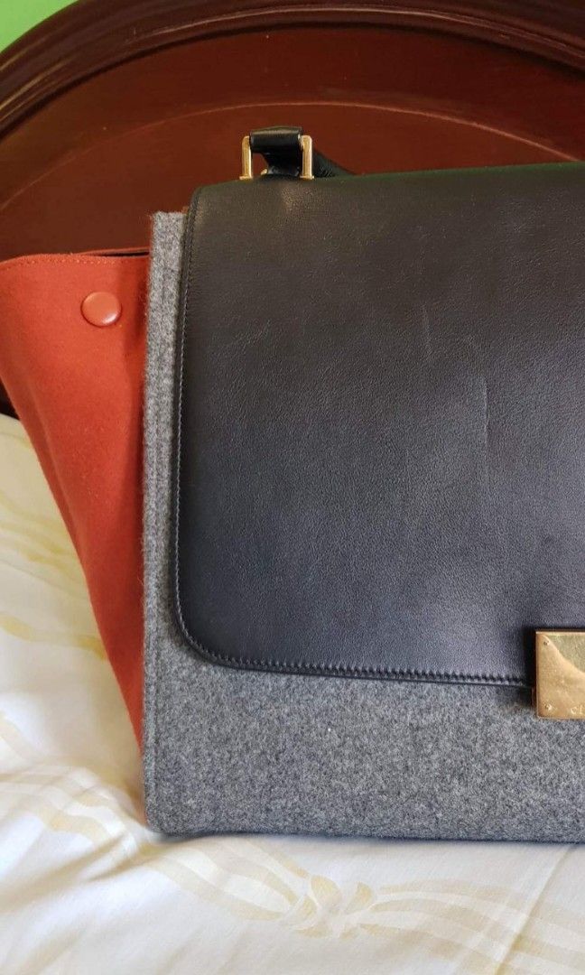 Celine Trapeze (Category: Luxury Bags & Wallets) located in Indang. Submitted by nrojales (Listing ID 1304156720, Image 3). Description: **with cards, dust bag and straps **soft leather and felt material.
