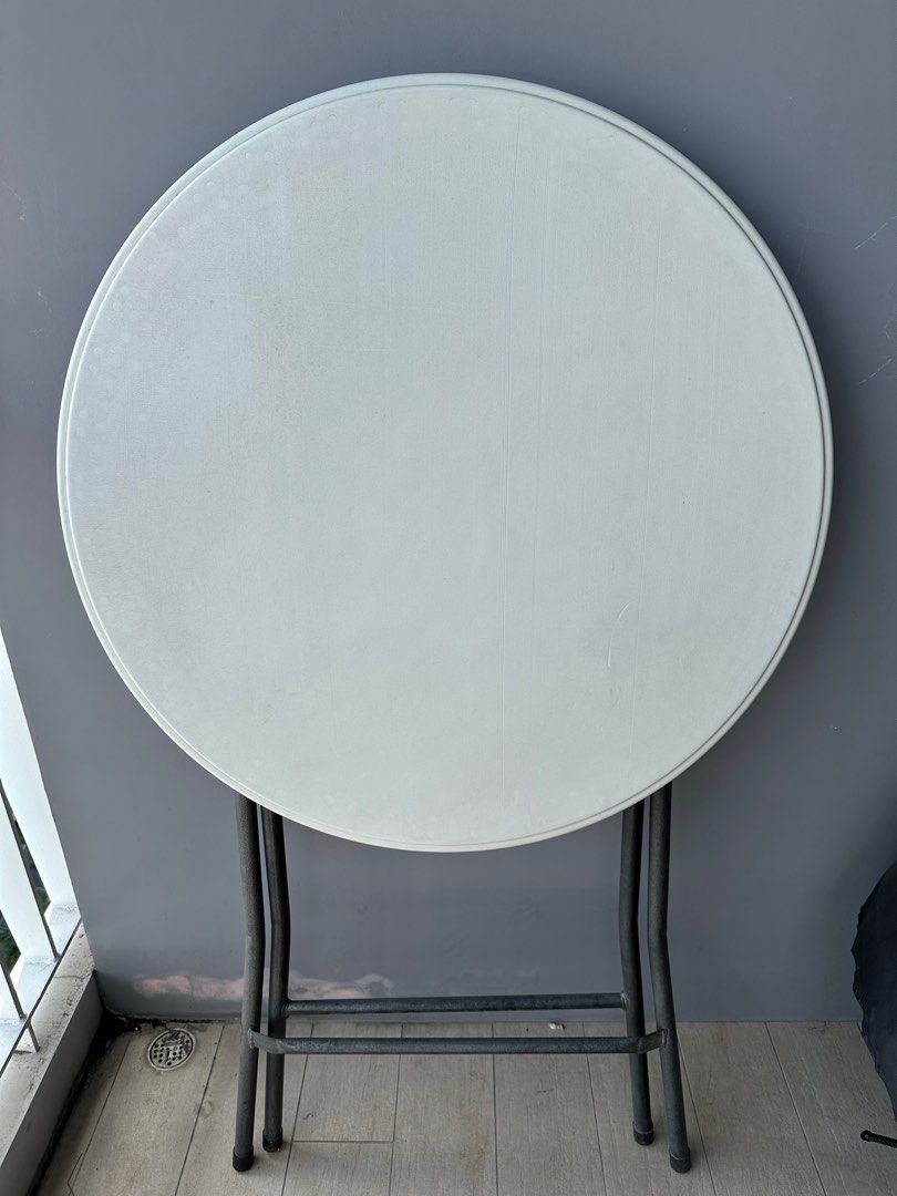 Foldable round table (Category: Tables & Sets) located in Singapore. Submitted by hejiahuan35989 (Listing ID 1304235033, Image 2). Description: Outdoor foldable round table. Well used, but in good working condition.