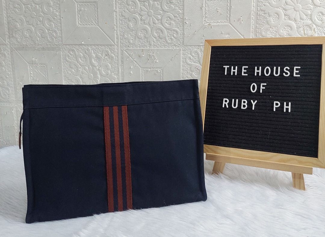 Hermes Fourre Tout Clutch/Pouch bag (Category: Luxury Bags & Wallets) located in Silang. Submitted by thehouseofrubyph (Listing ID 1304178704, Image 1). Description: Fourre Tout Clutch/cosmetic pouch Material: Cotton canvas Measurement: 9" X 12" X 4.5" In very good condition 20k only Add 2k-for a 2-month lay-away. 10% dp.