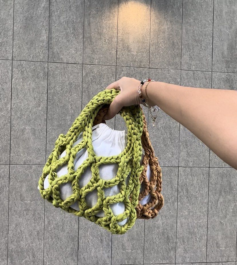 Korean Crochet Net Mini Handbag (only mustard available) (Category: Purses & Pouches) located in Pasig City. Submitted by alyyy26 (Listing ID 1304172391, Image 1). Description: Bought both and have not been used yet just stored at home. Both green and mustard available. Super cute for a pop of color for your outfit. Comes in a drawstring bag inside! These are both handmade from the PH. PM for details..