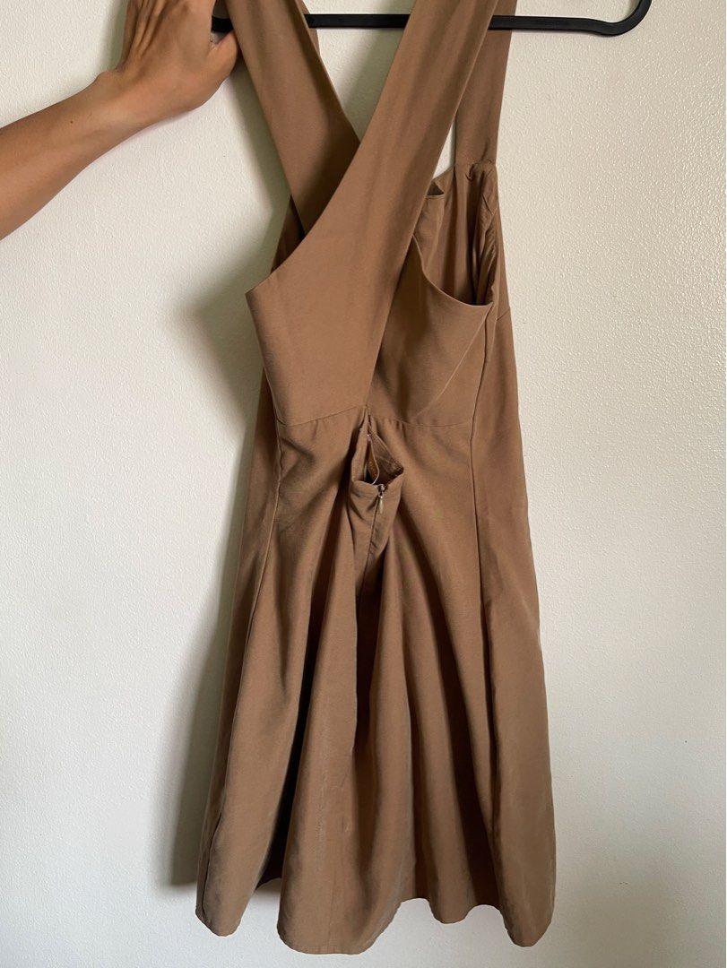 Mango Cross Back Dress (Category: Dresses) located in Paranaque City. Submitted by stphraynes (Listing ID 1304244108, Image 2). Description: Mango Cross Back Mini Dress - Size: Large - Color: Brown - Never used (natangal lang tag) - RFS: Too big.