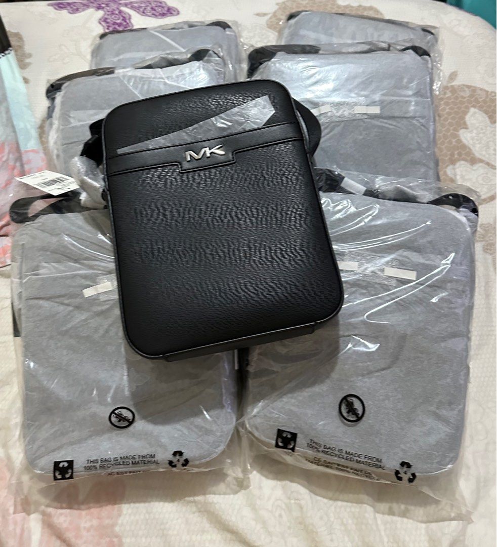 Mk cooper flight bag black (Category: Luxury Bags & Wallets) located in Pasig City. Submitted by jackie_ginger (Listing ID 1304207703, Image 1). Description: Onhand with tag and care card 💯orig from US.