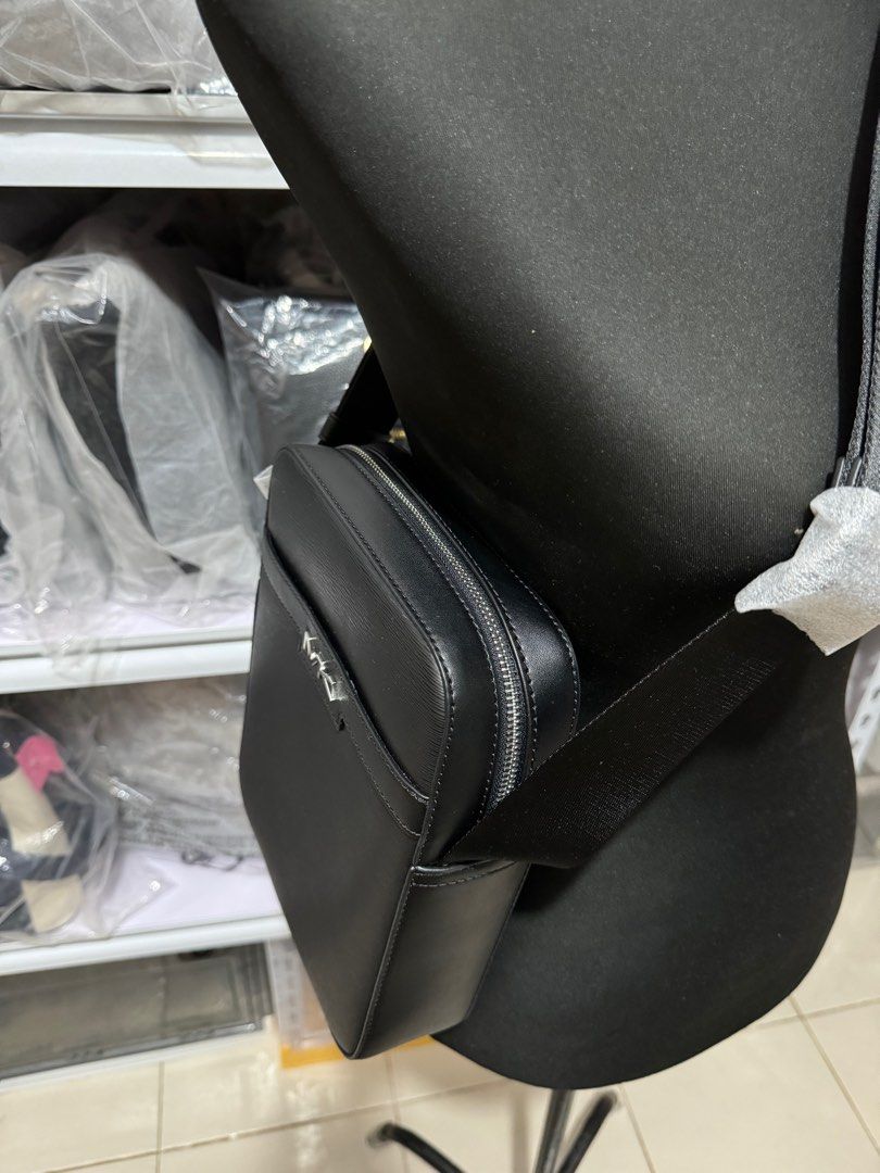 Mk cooper flight bag black (Category: Luxury Bags & Wallets) located in Pasig City. Submitted by jackie_ginger (Listing ID 1304207703, Image 3). Description: Onhand with tag and care card 💯orig from US.