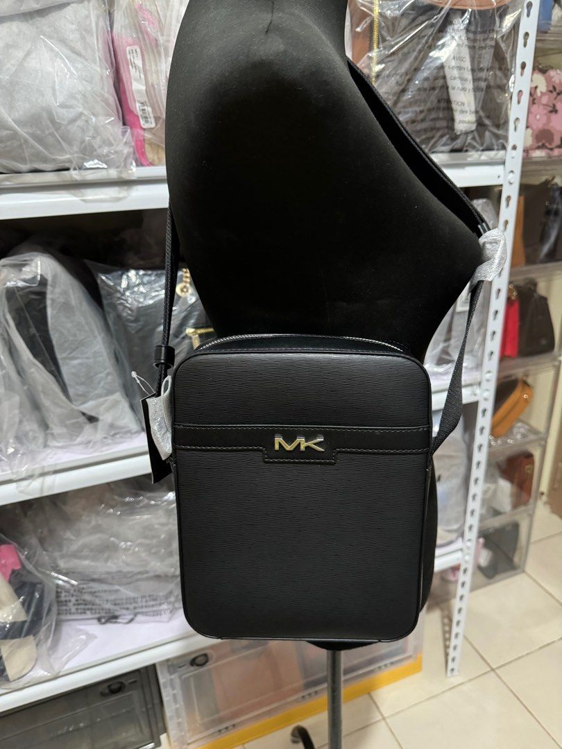 Mk cooper flight bag black (Category: Luxury Bags & Wallets) located in Pasig City. Submitted by jackie_ginger (Listing ID 1304207703, Image 2). Description: Onhand with tag and care card 💯orig from US.
