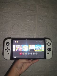 NINTENDO SWITCH OLED WITH GAMES