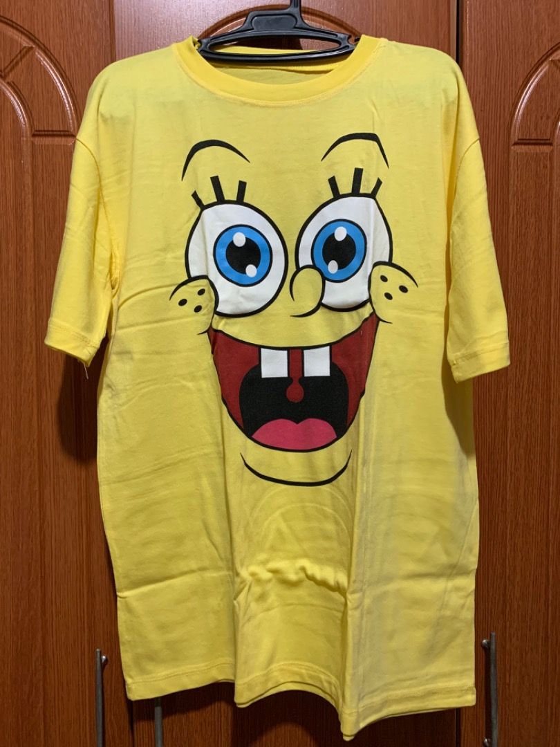 Oversized Spongebob shirt for women (Category: Shirts) located in Manila. Submitted by alberine (Listing ID 1304237326, Image 1). Description: MANAGE YOUR EXPECTATIONS PRE-LOVED TOP - fits XS-Medium frames only - Location: Manila - MOP: gcash - MOD: lbc, direct j&t, gogo xpress, same day delivery (lalamove or grab) - shipping fee must be shouldered by buyer.