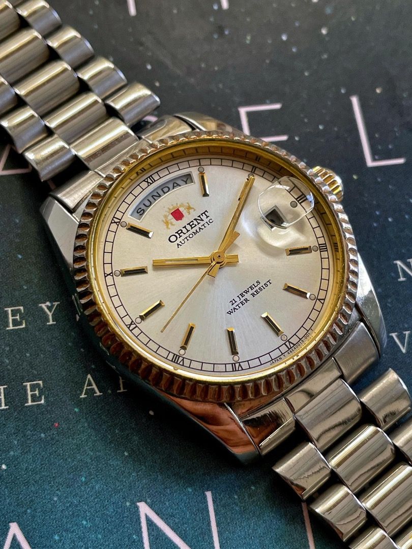 Rare Orient 1st Generation President Day Date Ref. 2EV03001W Stainless Steel Case Gold Fluted Bezel Sunburst Champagne Gold Dial Day Date