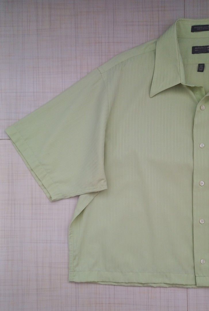 Sage Green Oversized Boxy Cropped Polo (Category: Formal Shirts) located in Legazpi City. Submitted by hewhodeclutters (Listing ID 1304110473, Image 2). Description: Sage Green Oversized Boxy Cropped Polo Size: Medium to XL Dimensions: Width - 24.5 inches Length - 24 inches Condition: 10/10 (Like New) Color may vary due to lighting but actual color is Sage Green. Mode of Payment: GCash Price is slightly negotiable so don't hesitate to make your o